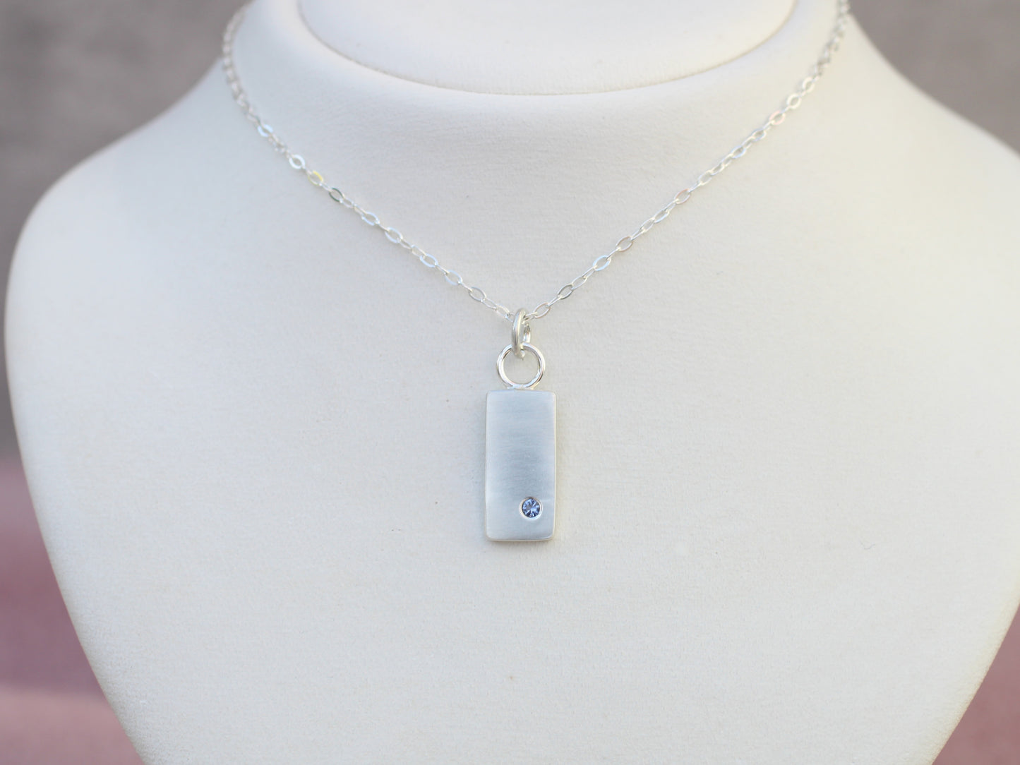 Birthstone pendant necklace.
