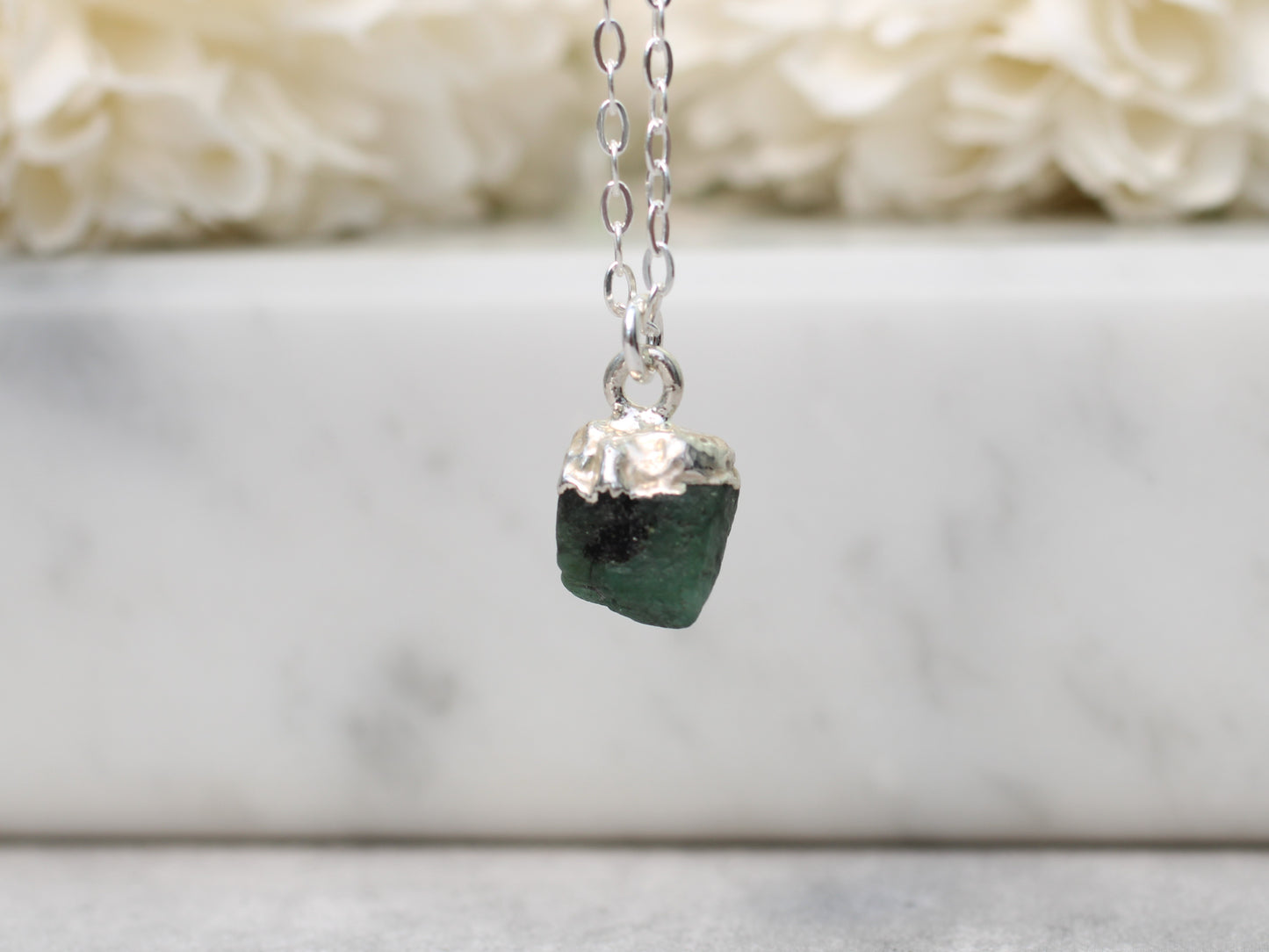 Raw emerald necklace. May birthstone necklace.