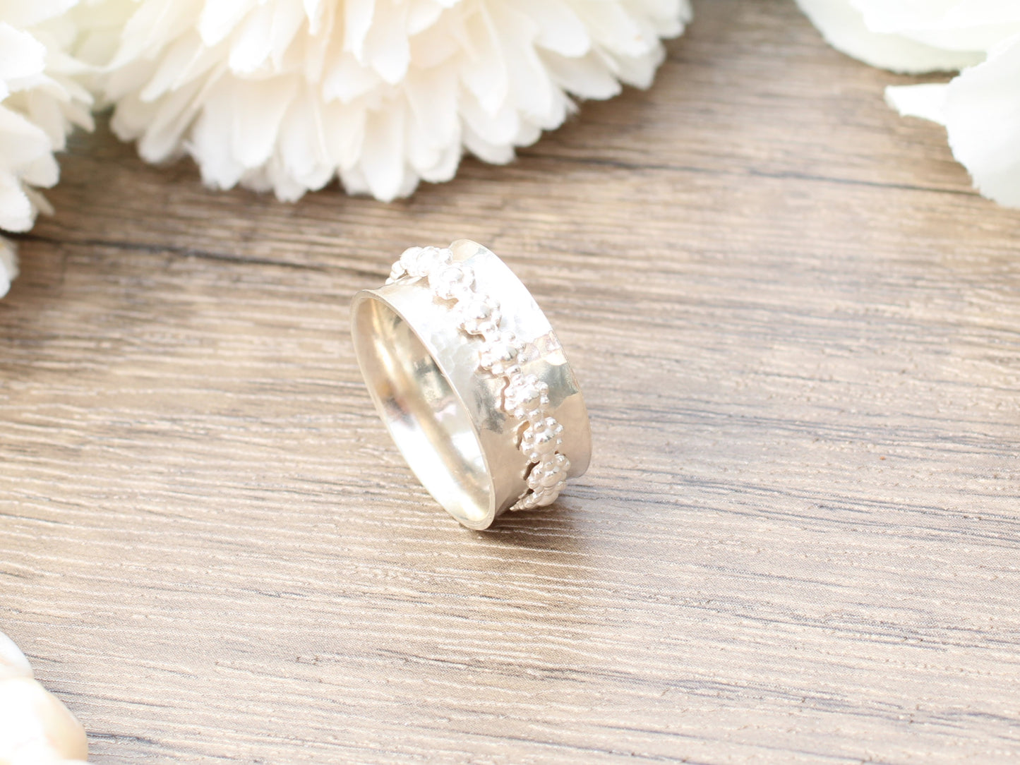 Sterling silver flower/daisy spinner ring. Anxiety ring.