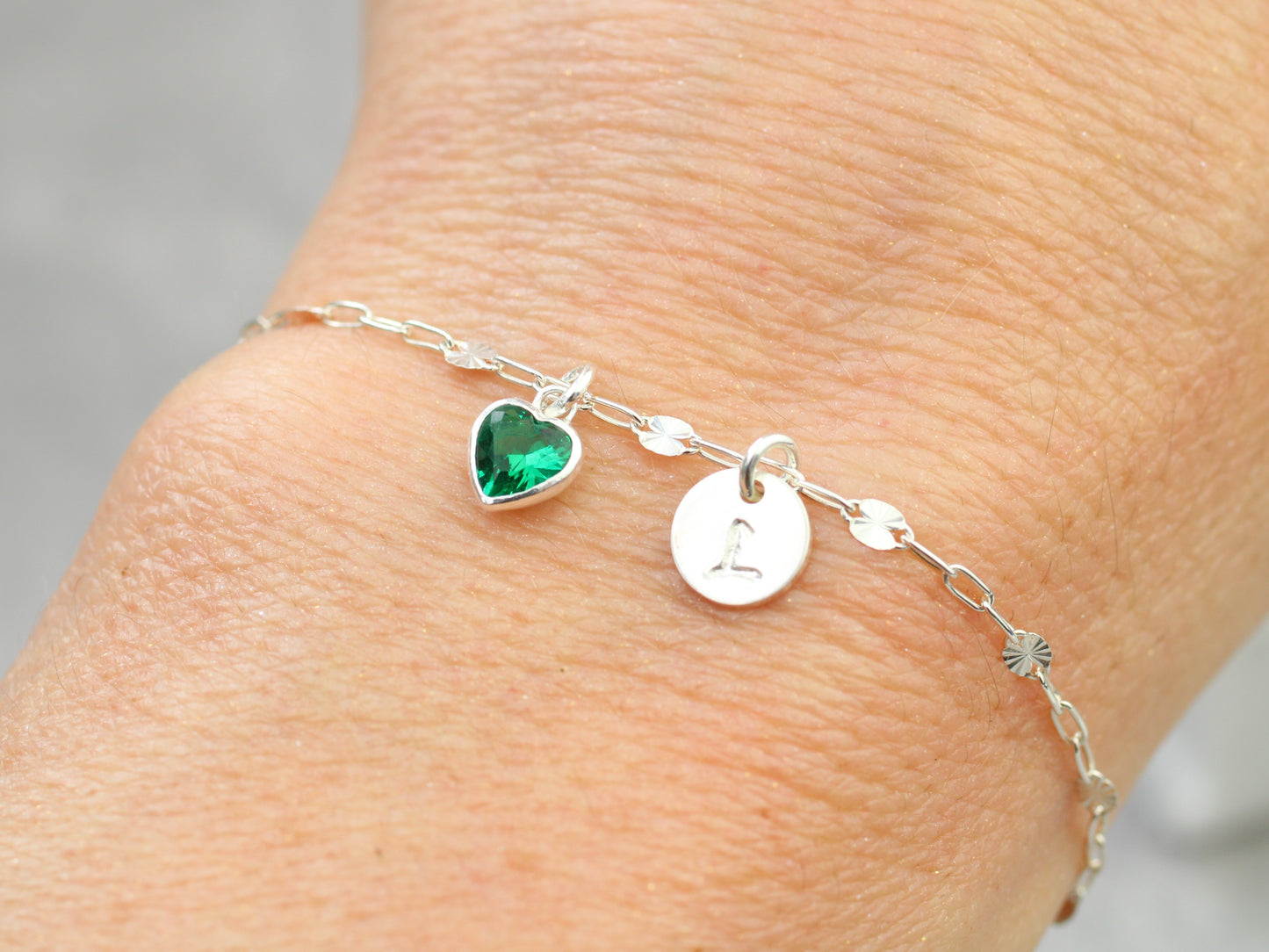 Personalised birthstone and initial adjustable bracelet.