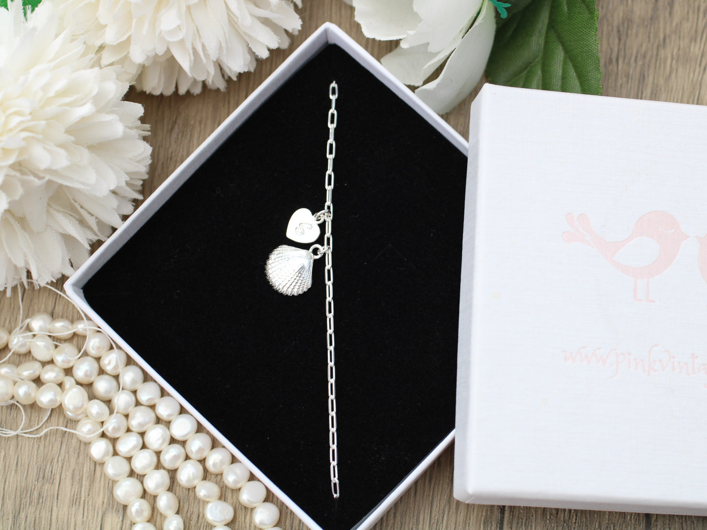 Personalised seashell bracelet in silver.