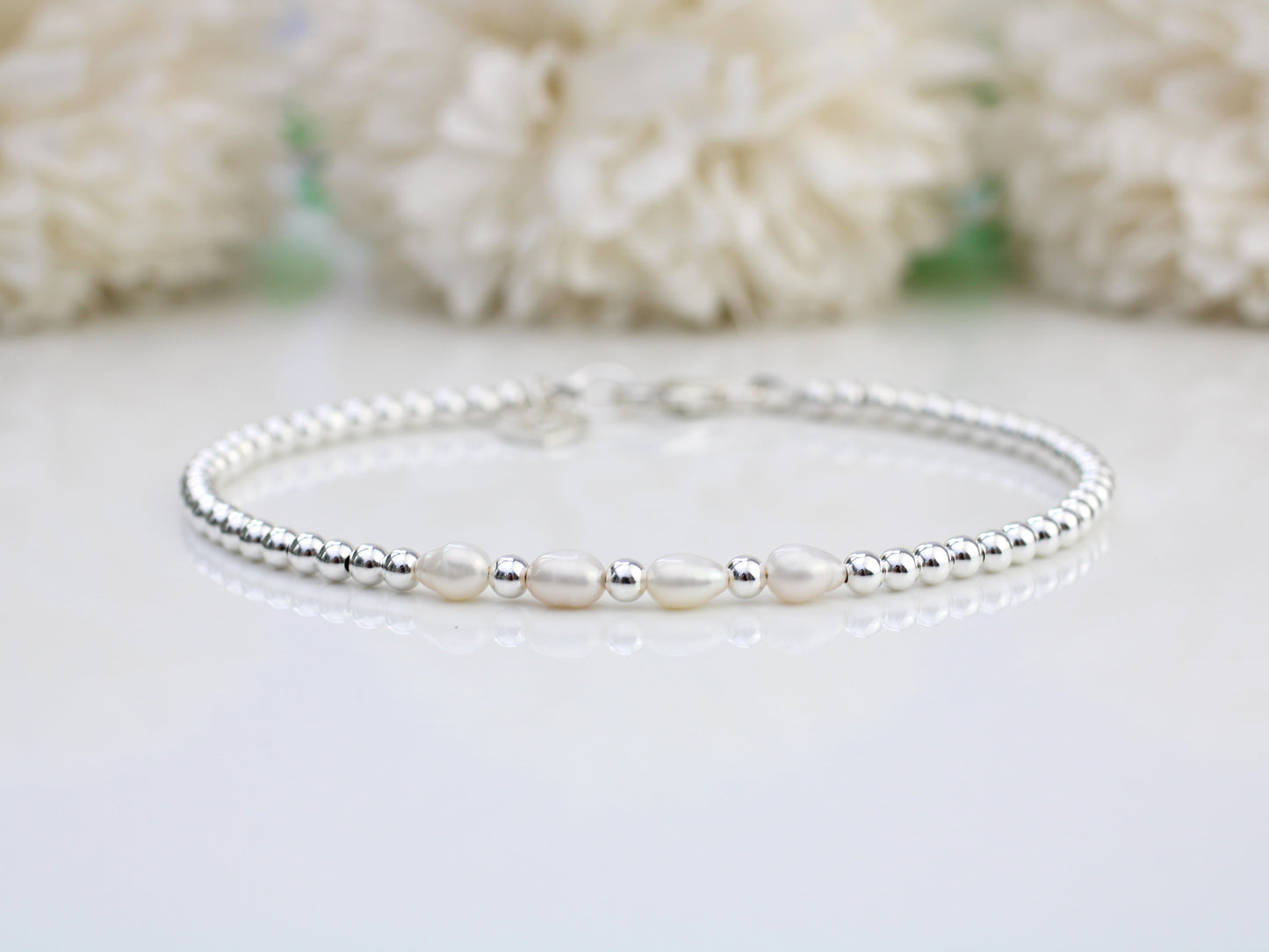 Freshwater pearl milestone bracelet.