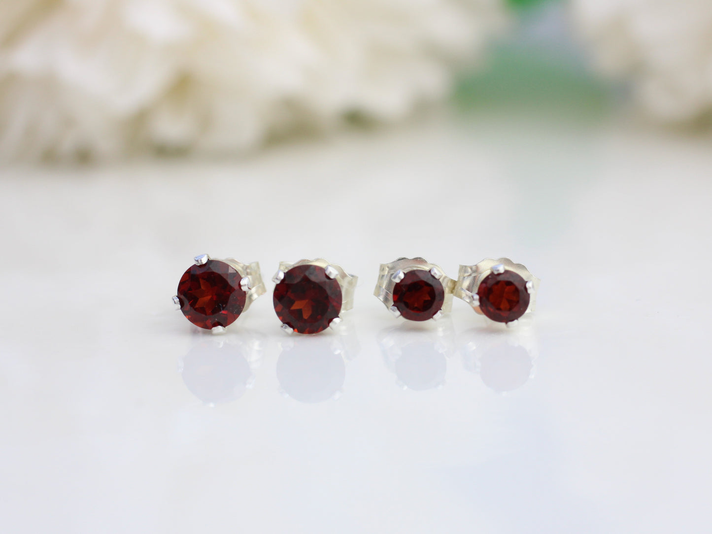 Garnet stud earrings. January birthstone earrings.