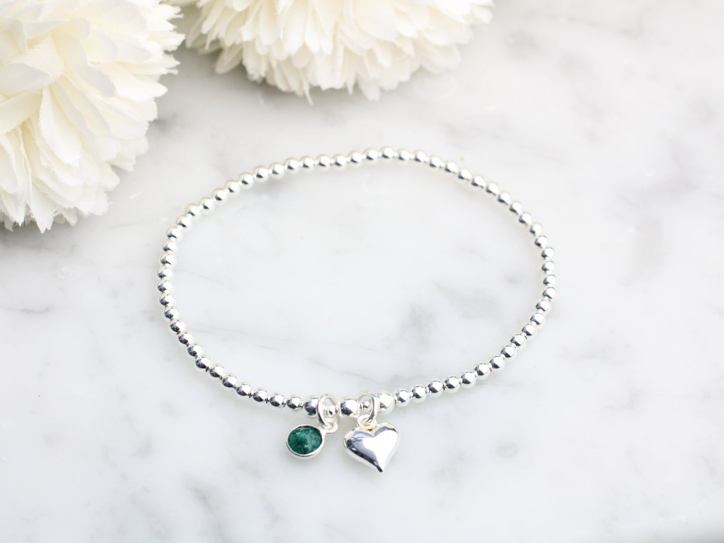May birthstone charm bracelet.