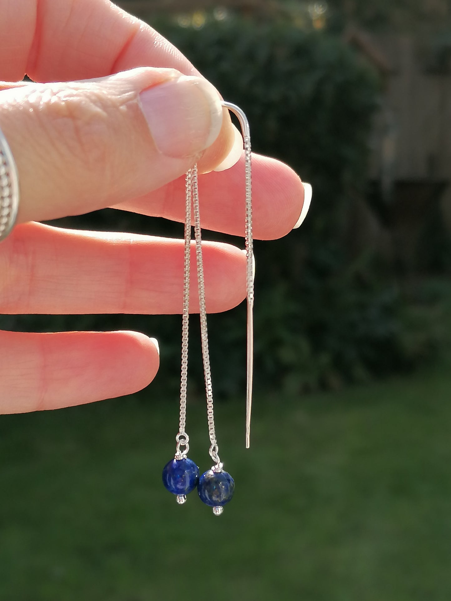 Lapis lazuli threader earrings in sterling silver.