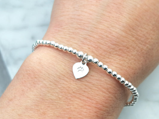 Paw bracelet in silver. Dog remembrance gift.