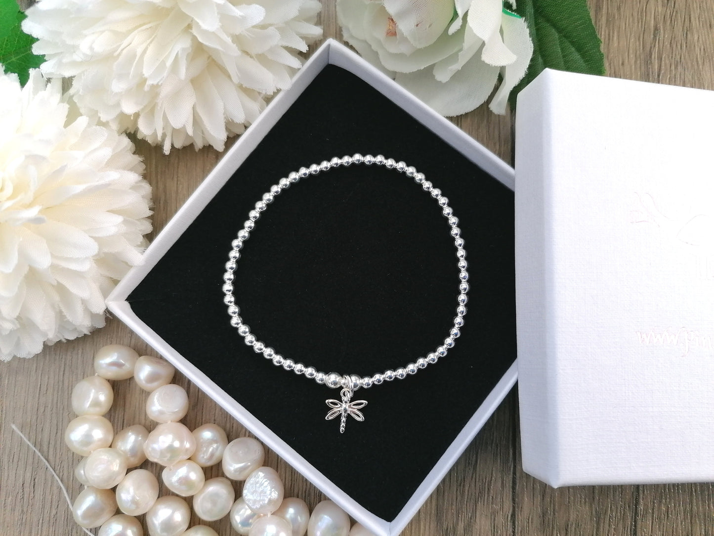 Dragonfly charm bracelet.