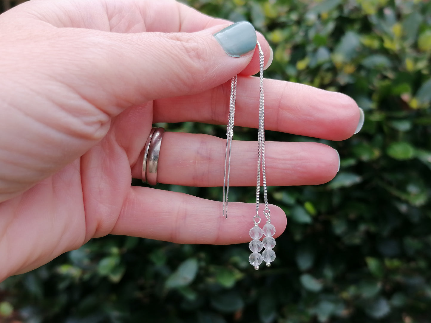 Crystal quartz threader earrings in sterling silver. April birthstone earrings.