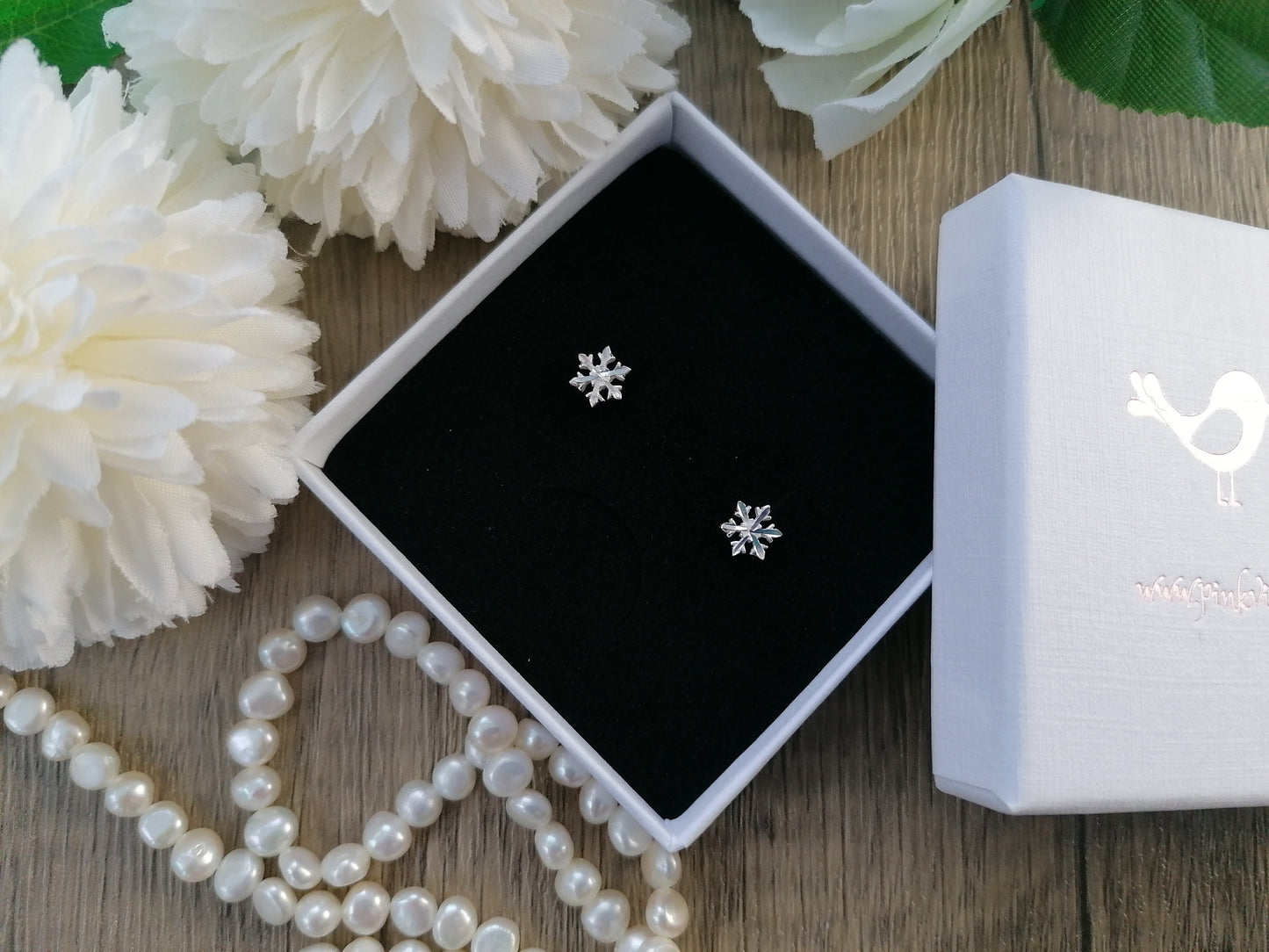 Snowflake stud earrings.