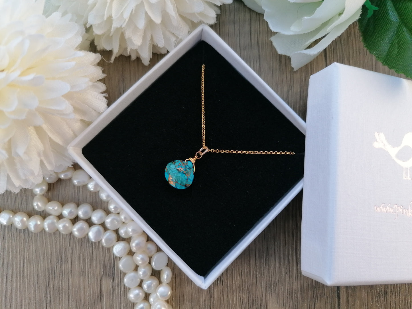 Turquoise necklace in sterling silver or gold.