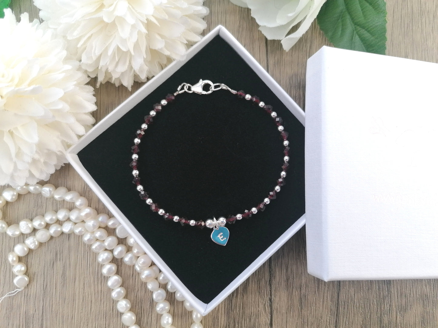 Garnet initial bracelet.
