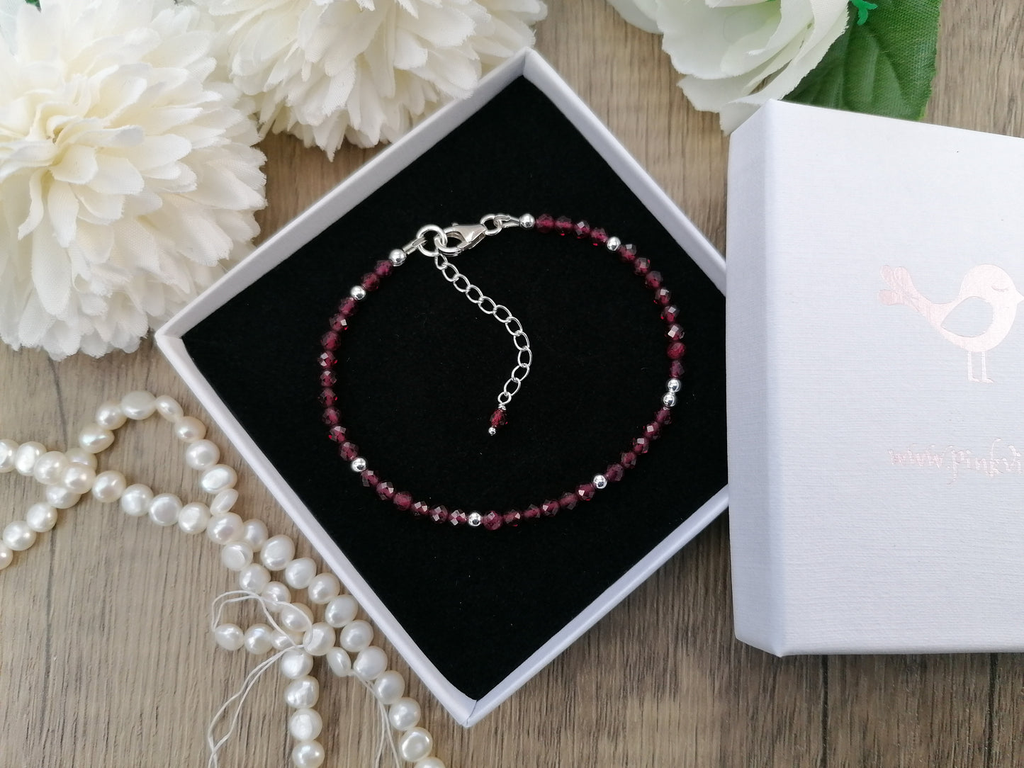 Personalised garnet bracelet in sterling silver.