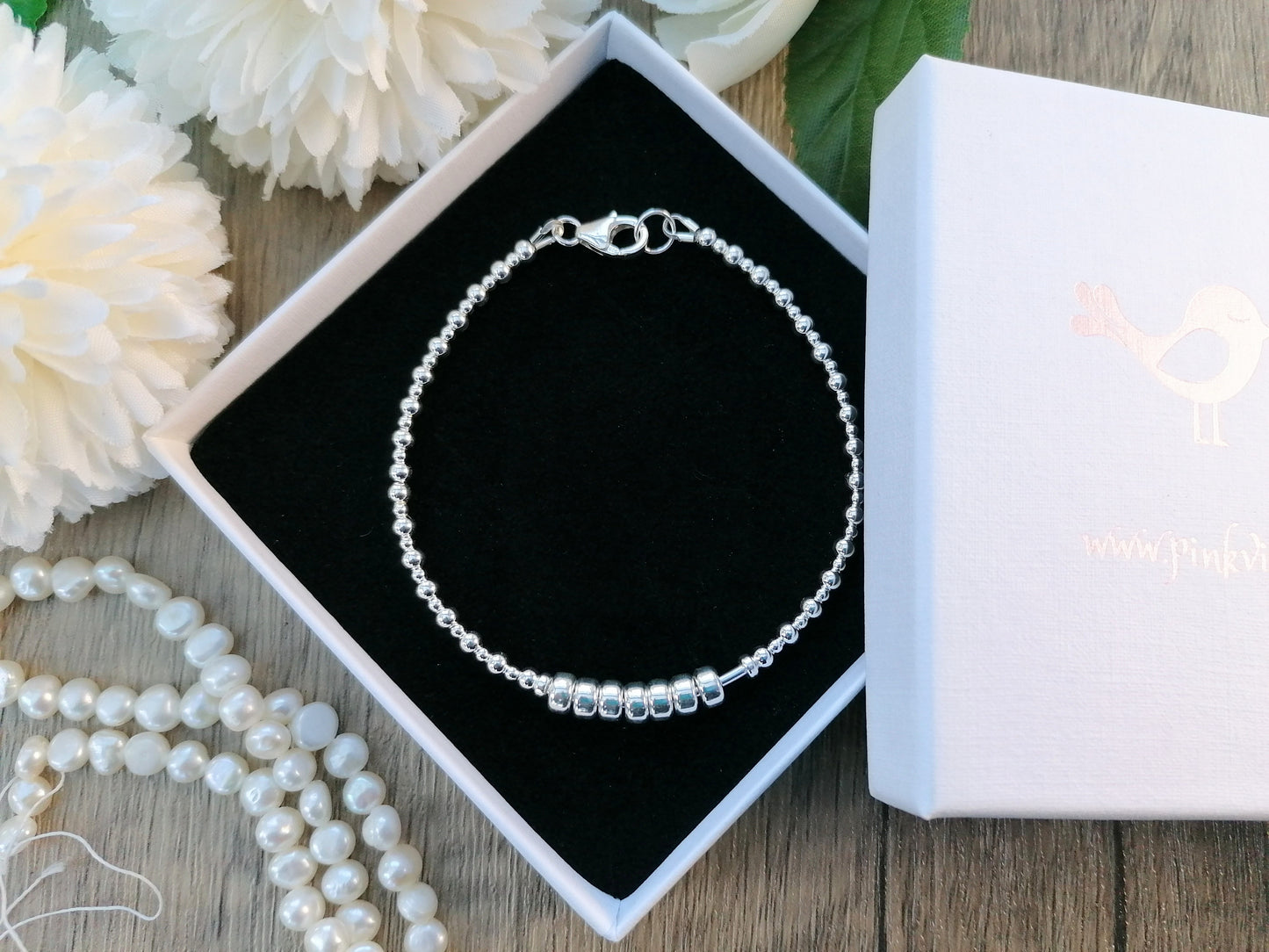 70th birthday bracelet in sterling silver.