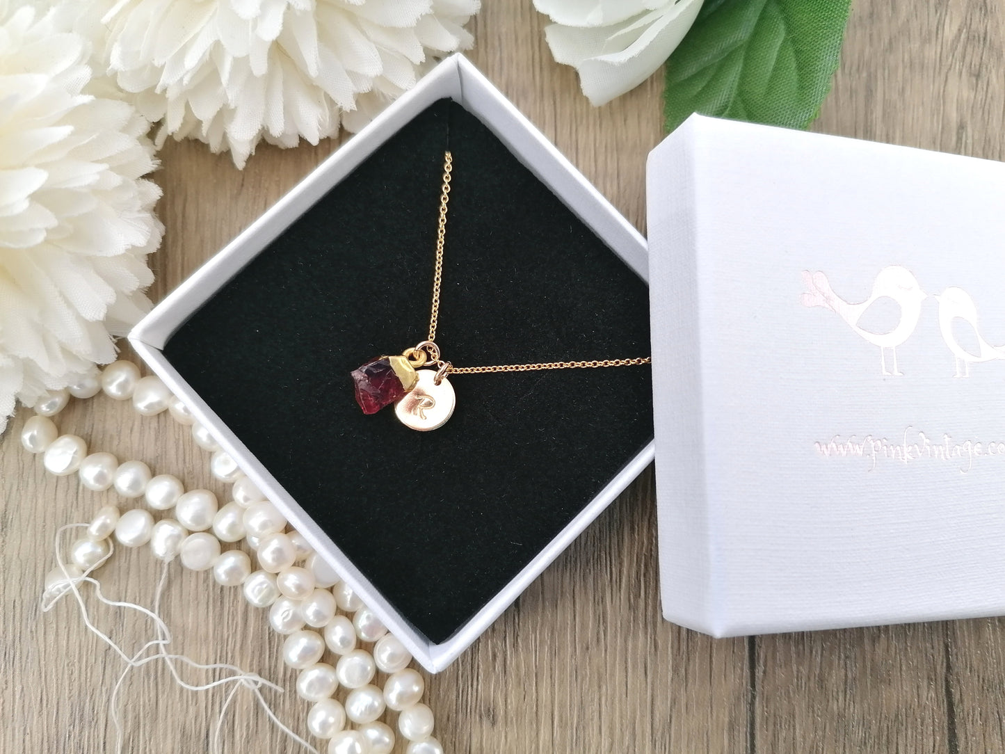 Personalised raw garnet necklace in gold.