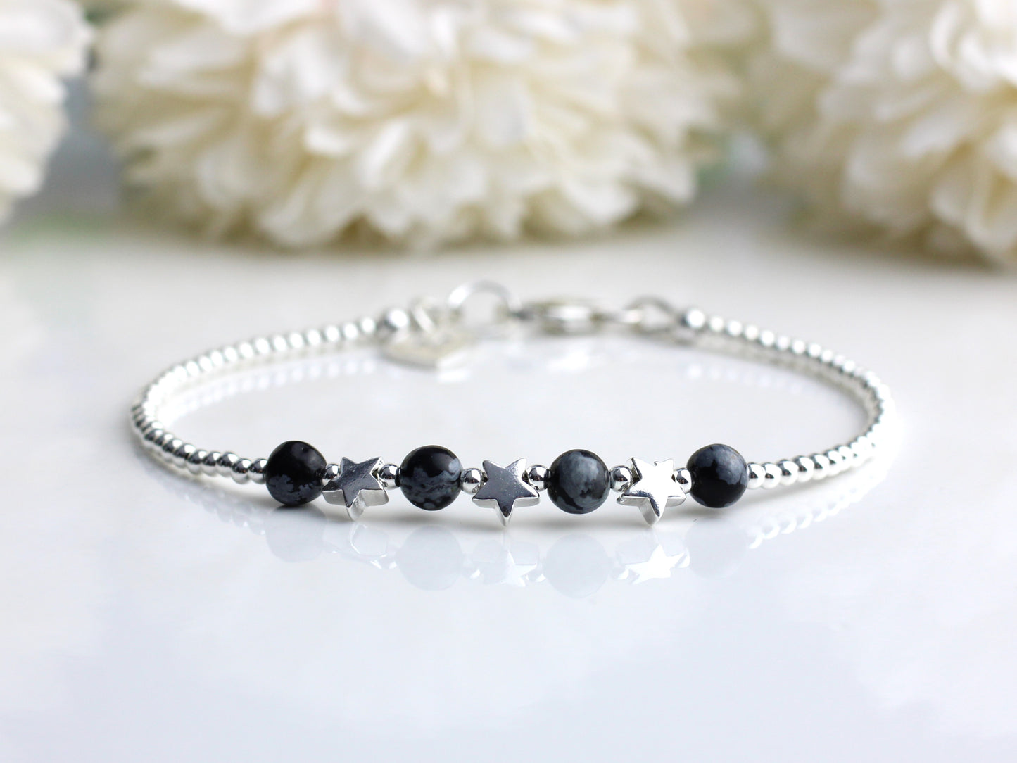 Snowflake obsidian bracelet in sterling silver with optional personalised tag - initial, number or zodiac sign.