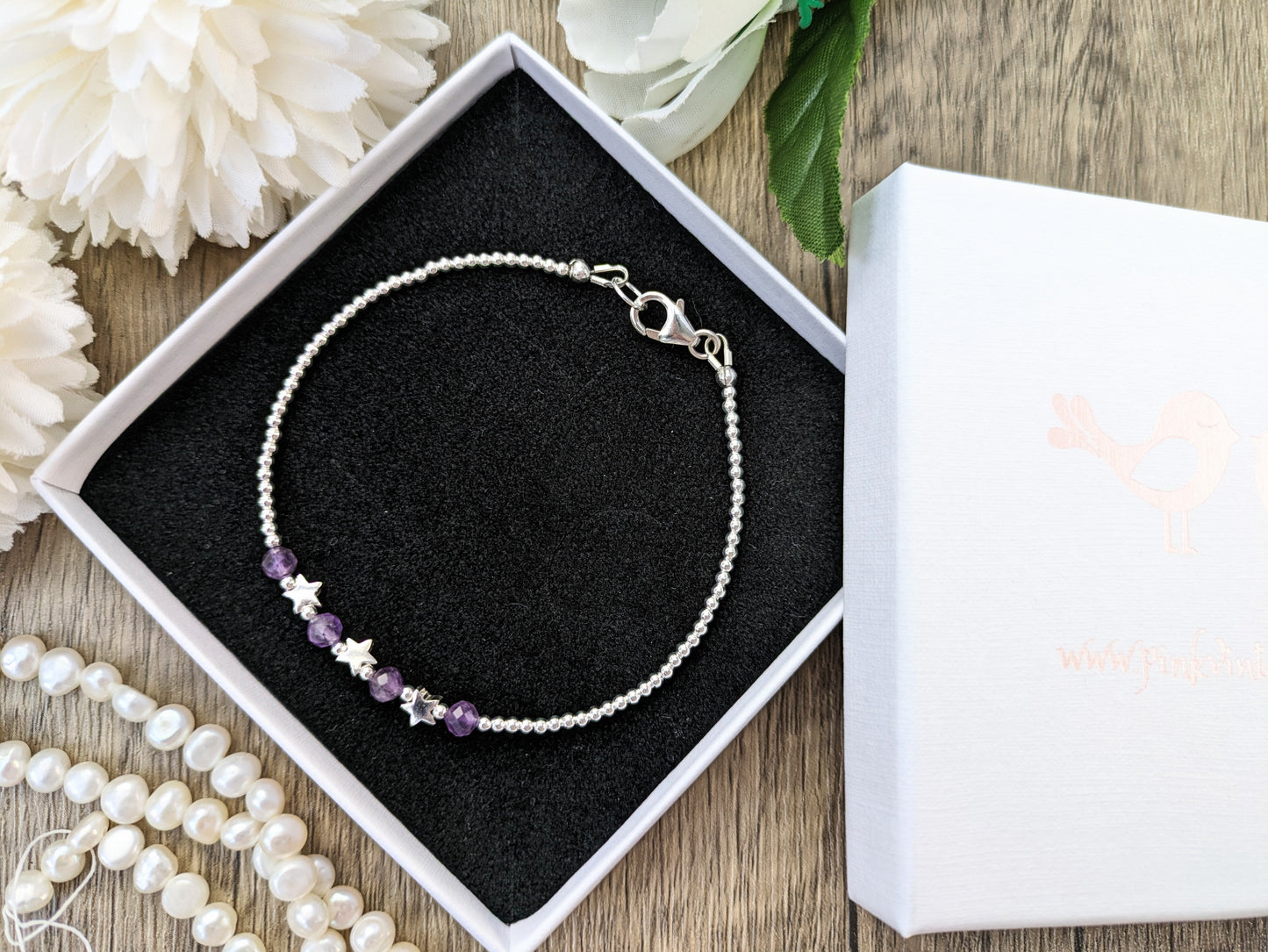 Star bracelet with amethyst gemstones.