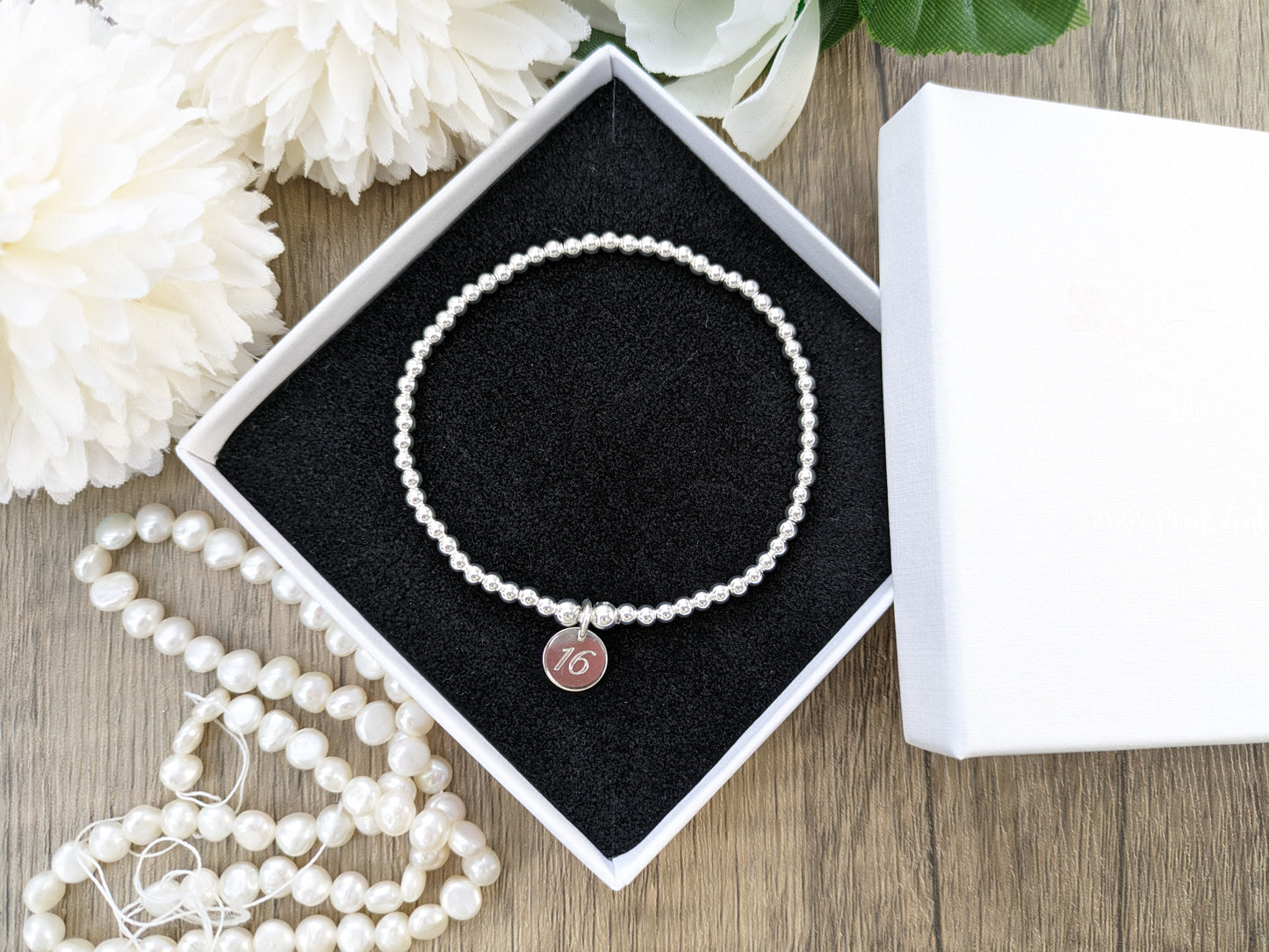 16th birthday bracelet in sterling silver.