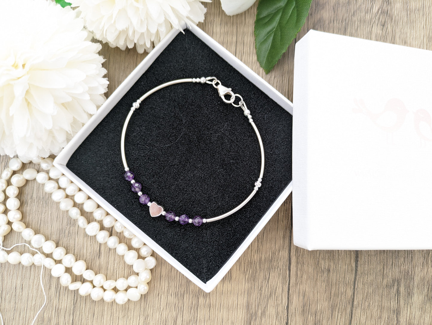 Amethyst birthstone bracelet in sterling silver.