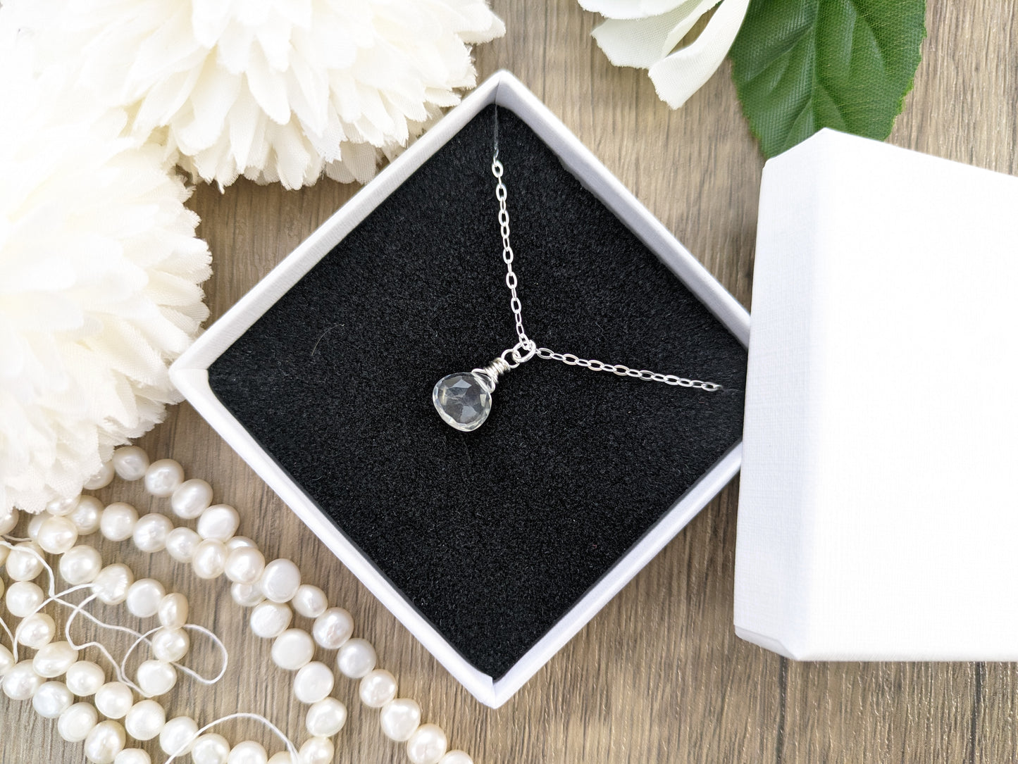 Clear quartz necklace in silver or gold.