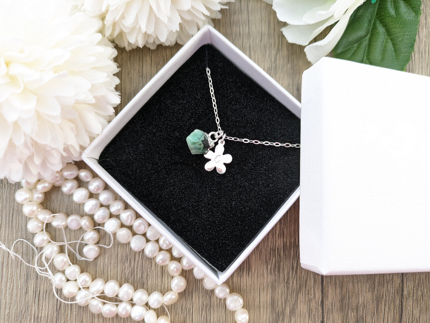 Personalised emerald necklace in silver.