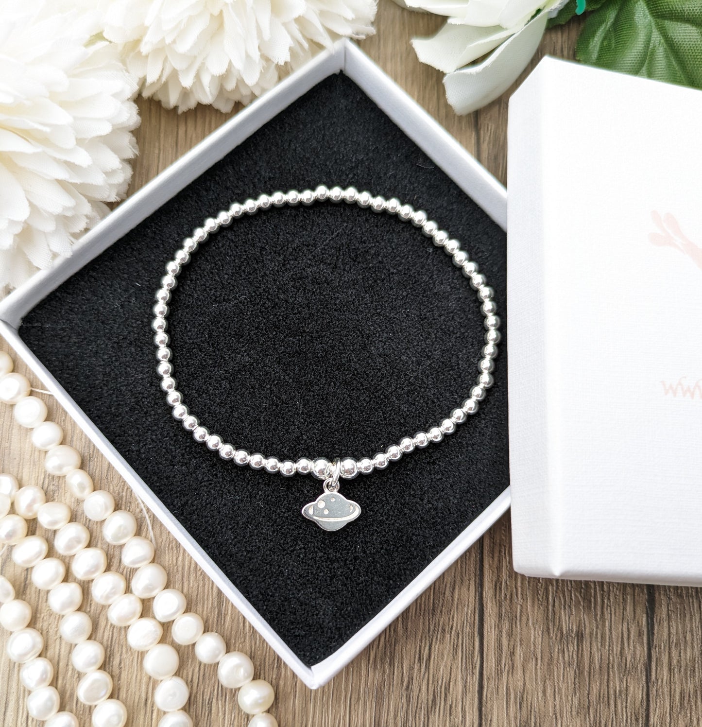 Planet charm bracelet.