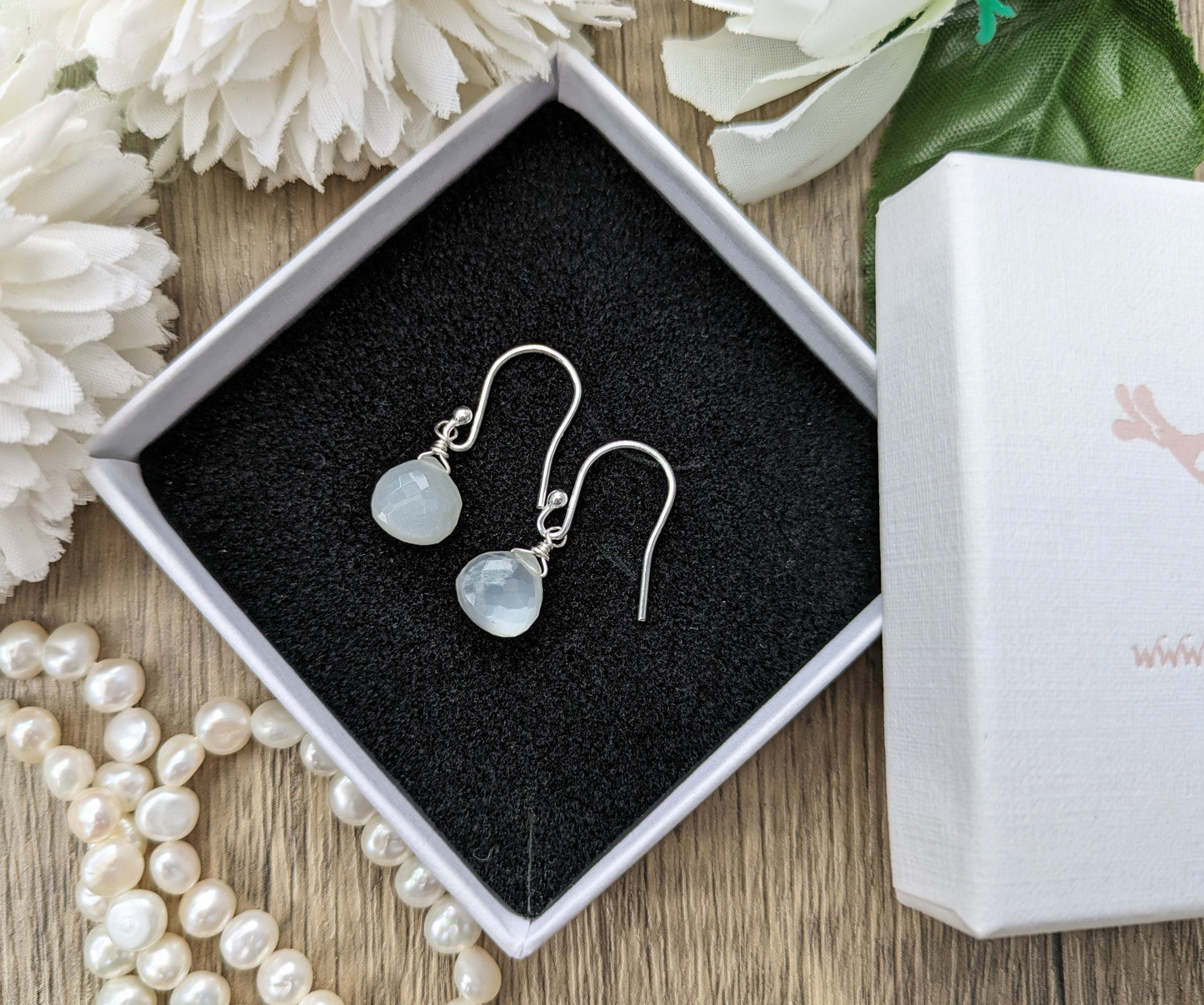 Moonstone drop earrings in silver or gold.