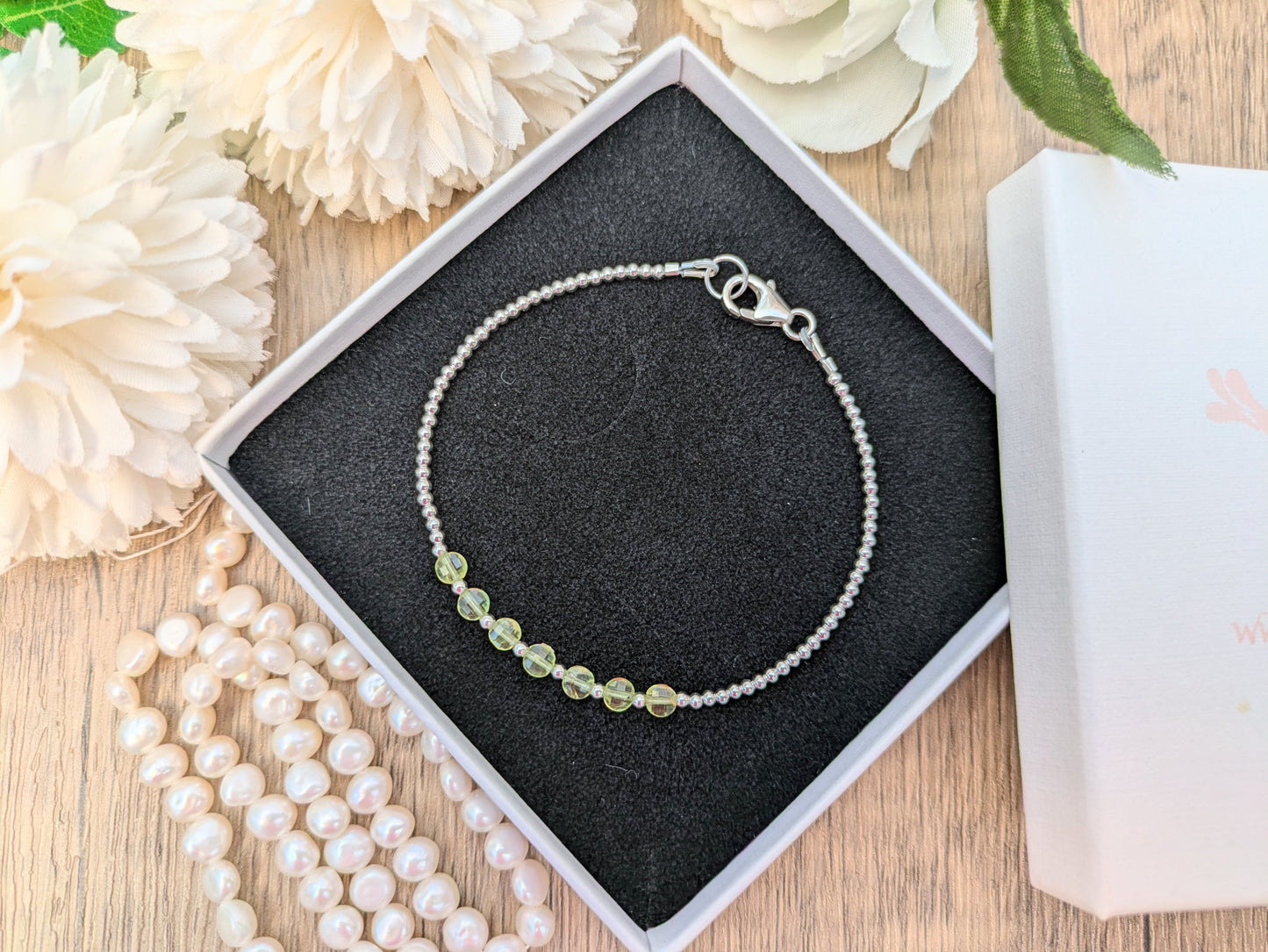 Peridot bead bracelet in sterling silver.