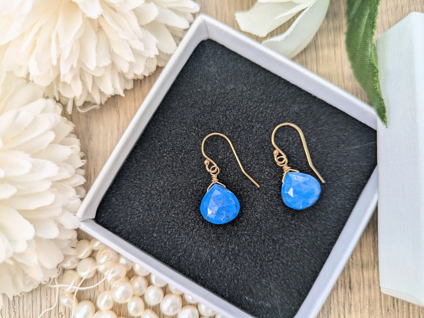Lapis lazuli earrings in silver and gold.