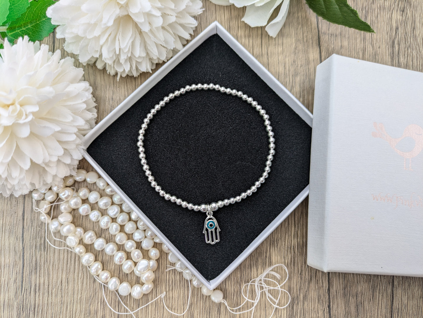 Hamsa charm bracelet.