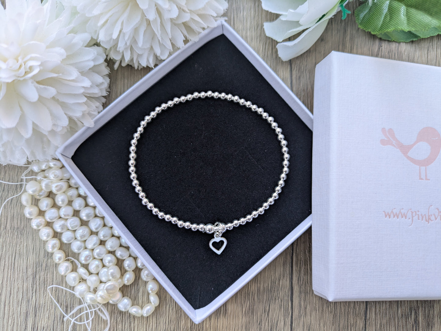 Open heart charm bracelet