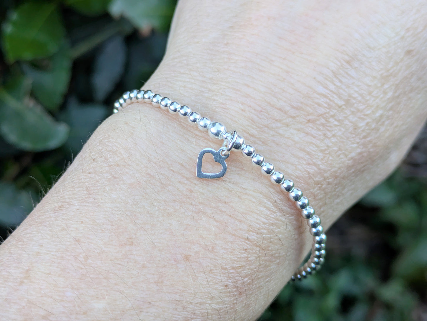 Open heart charm bracelet