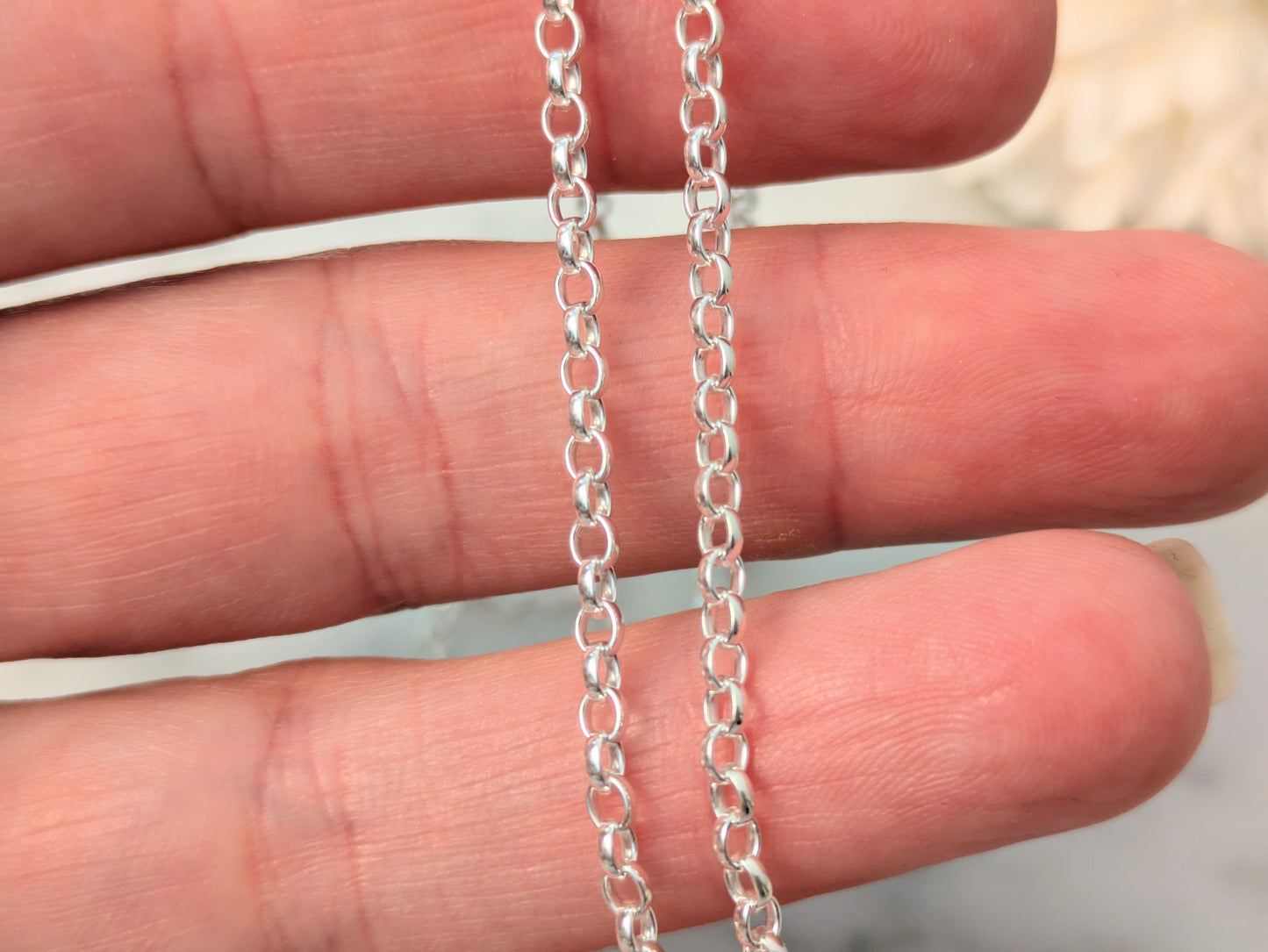 Sterling silver medium weight belcher chain.
