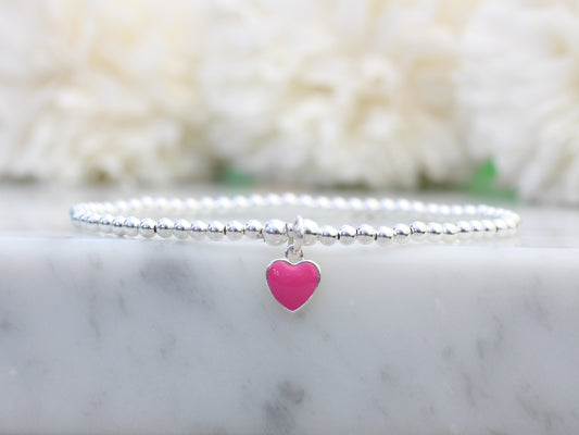 Pink heart charm bead bracelet.