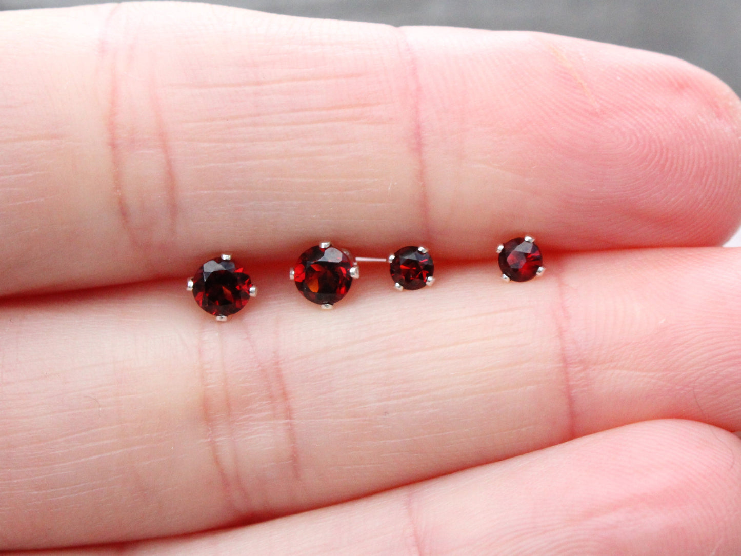 Garnet stud earrings. January birthstone earrings.