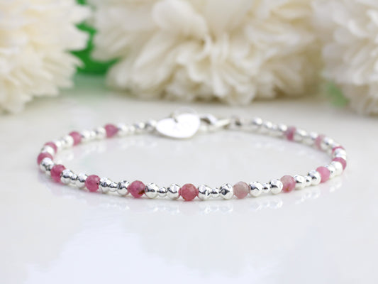 Pink tourmaline bracelet in sterling silver with optional personalised tag. October birthday bracelet.