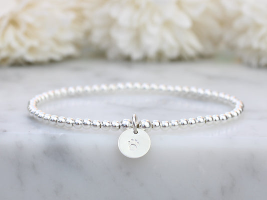 Dog pawprint stretch bracelet.