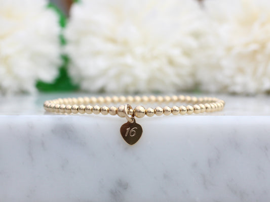 birthday bracelet in gold