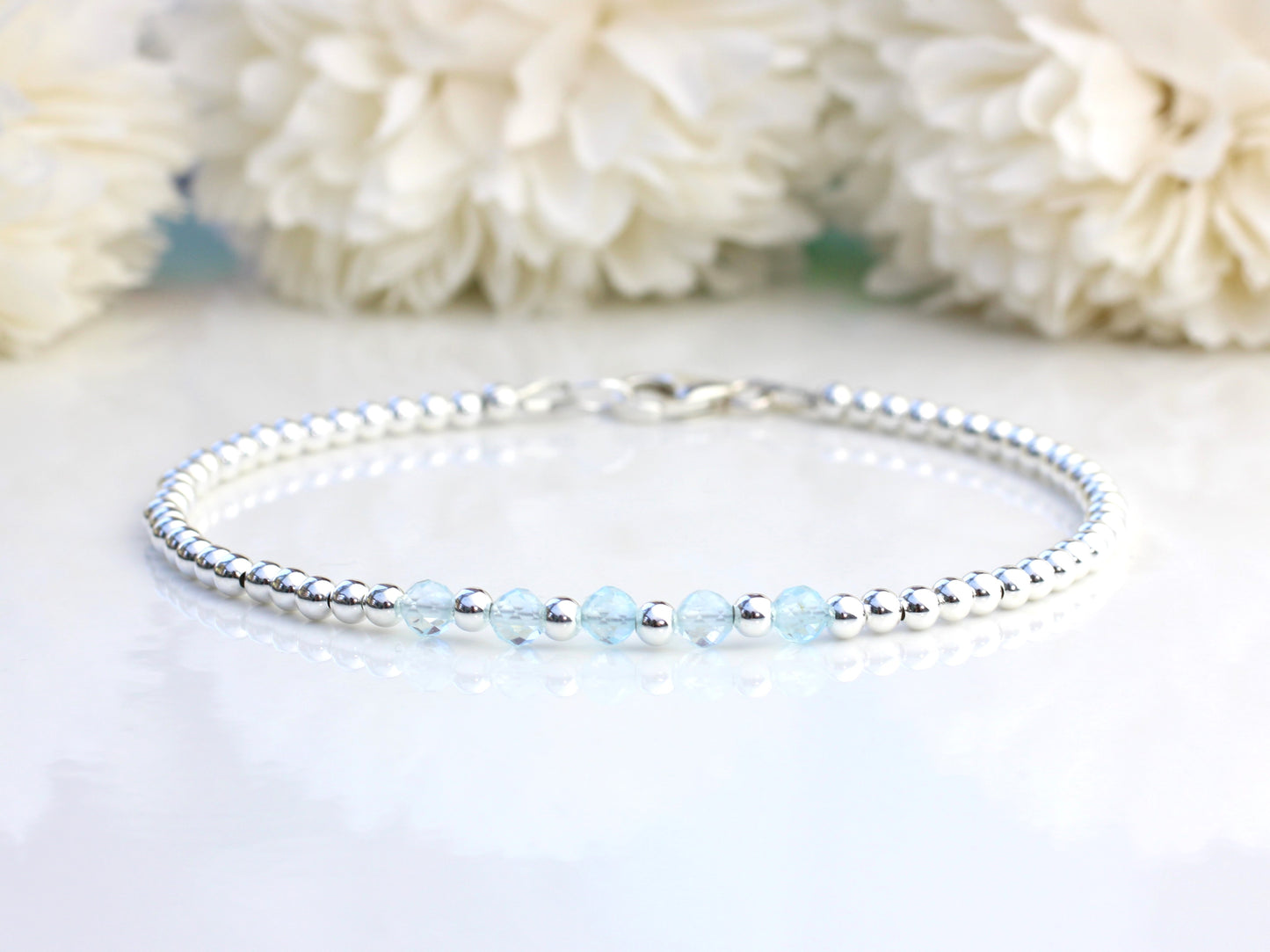 blue topaz milestone bracelet