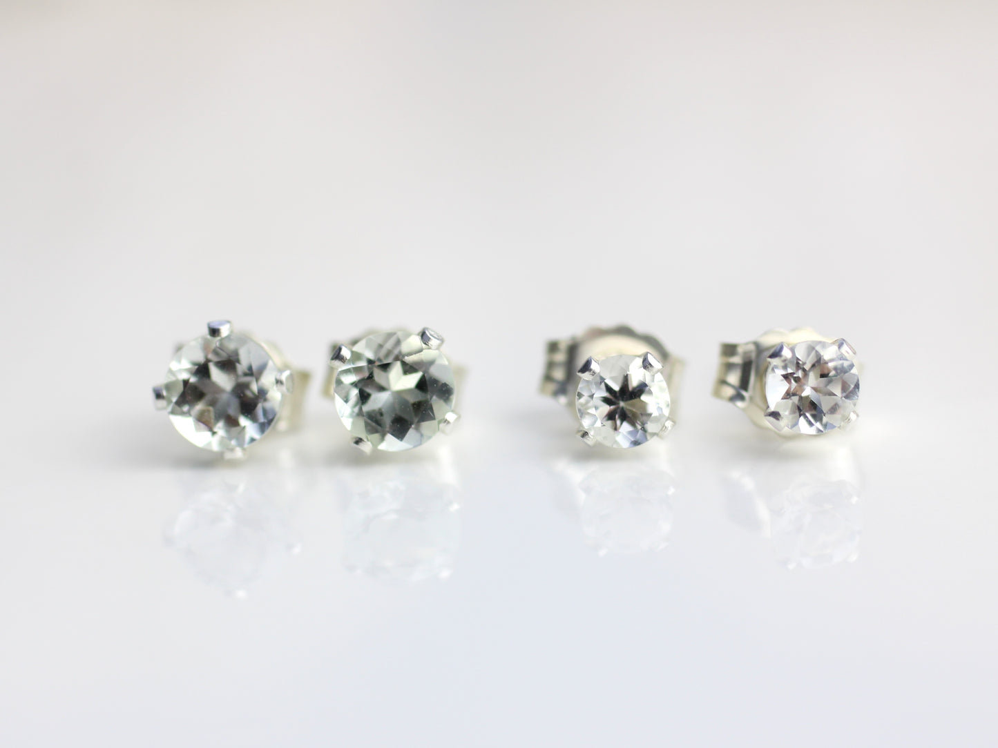 Green amethyst stud earrings in silver or gold.