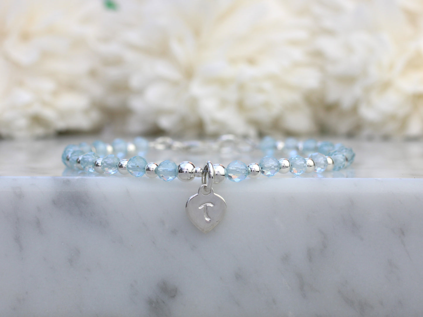 Personalised blue topaz bracelet.