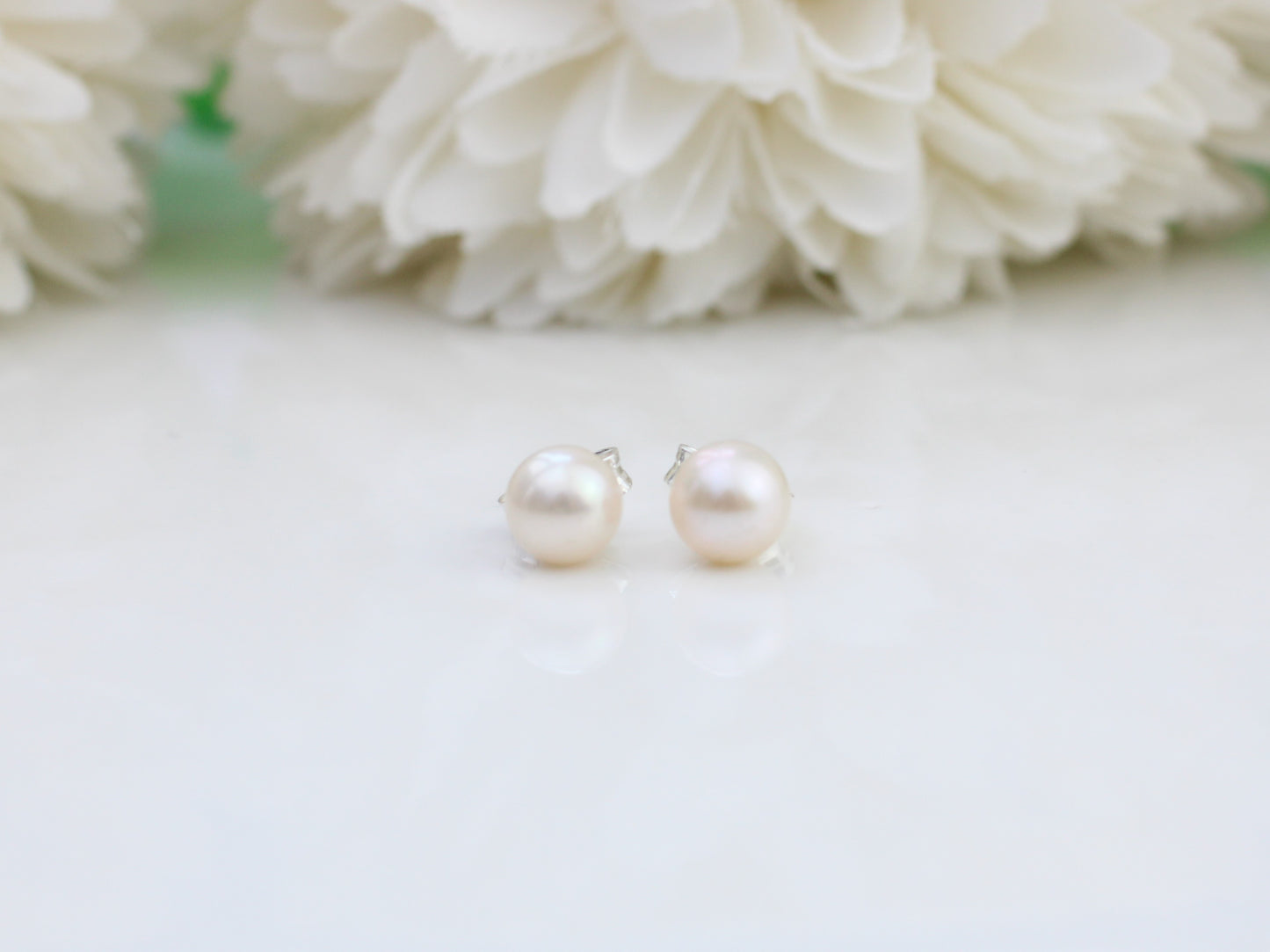 Silver pearl stud earrings. June birthstone.