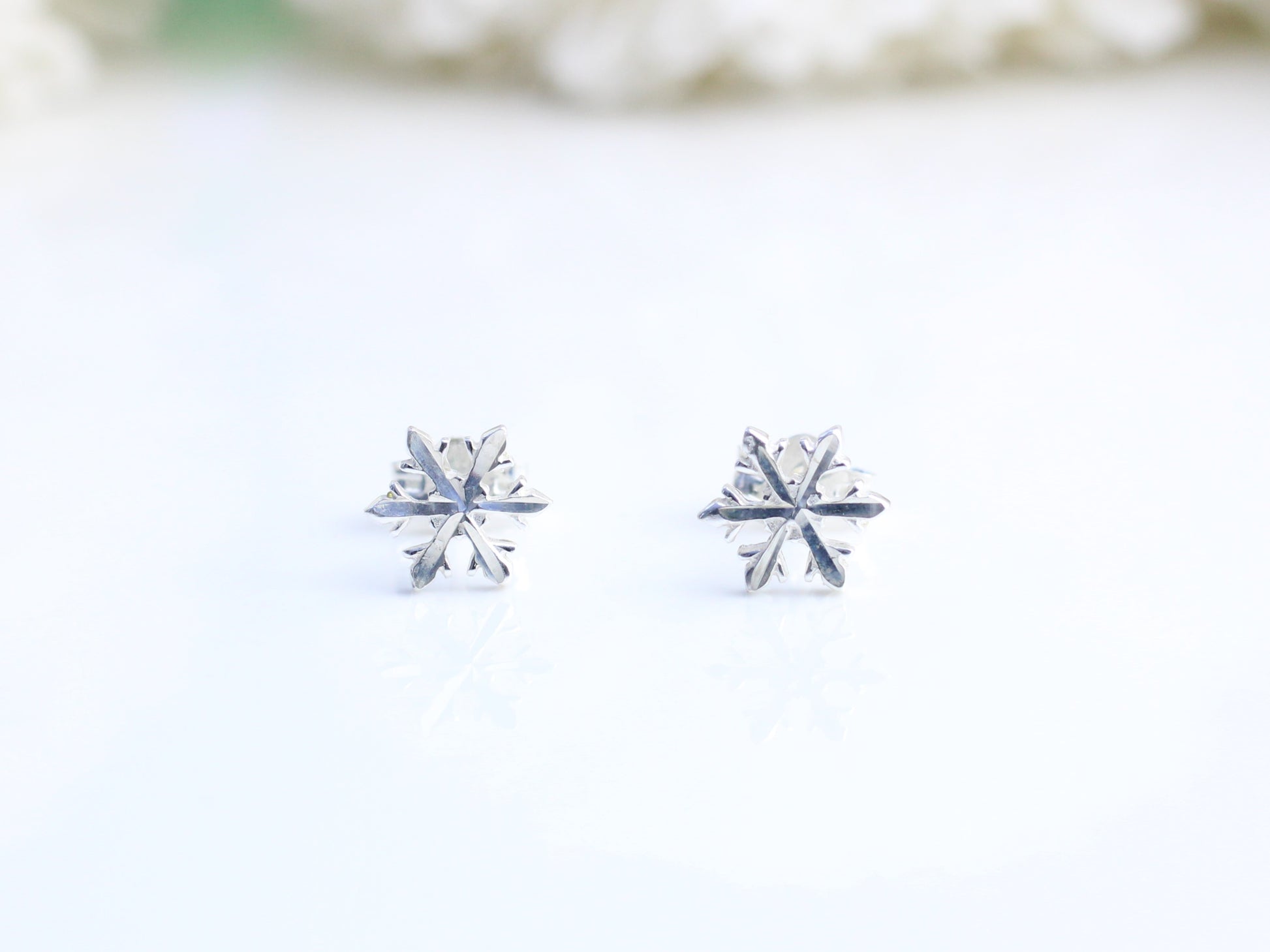snowflake stud earrings