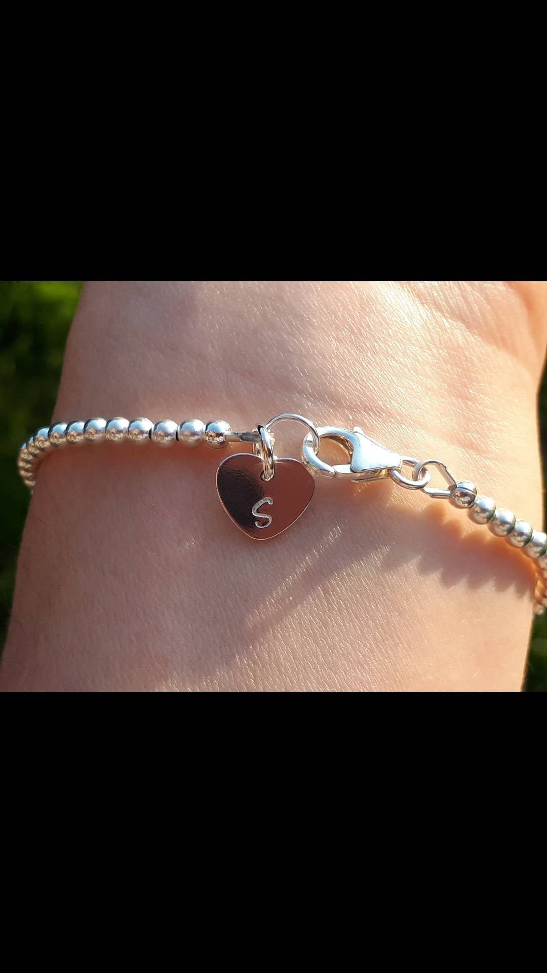 Snowflake charm bracelet.