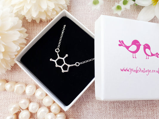 Chocolate molecule necklace in sterling silver. Can be personalised.