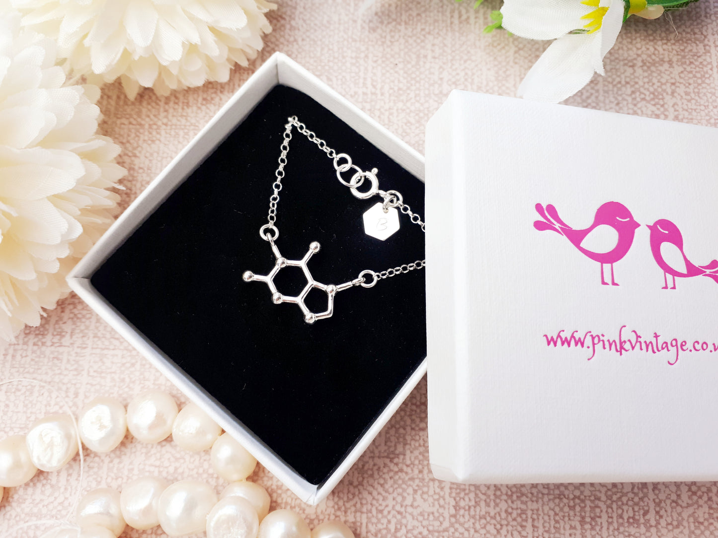 Chocolate molecule necklace in sterling silver. Can be personalised.