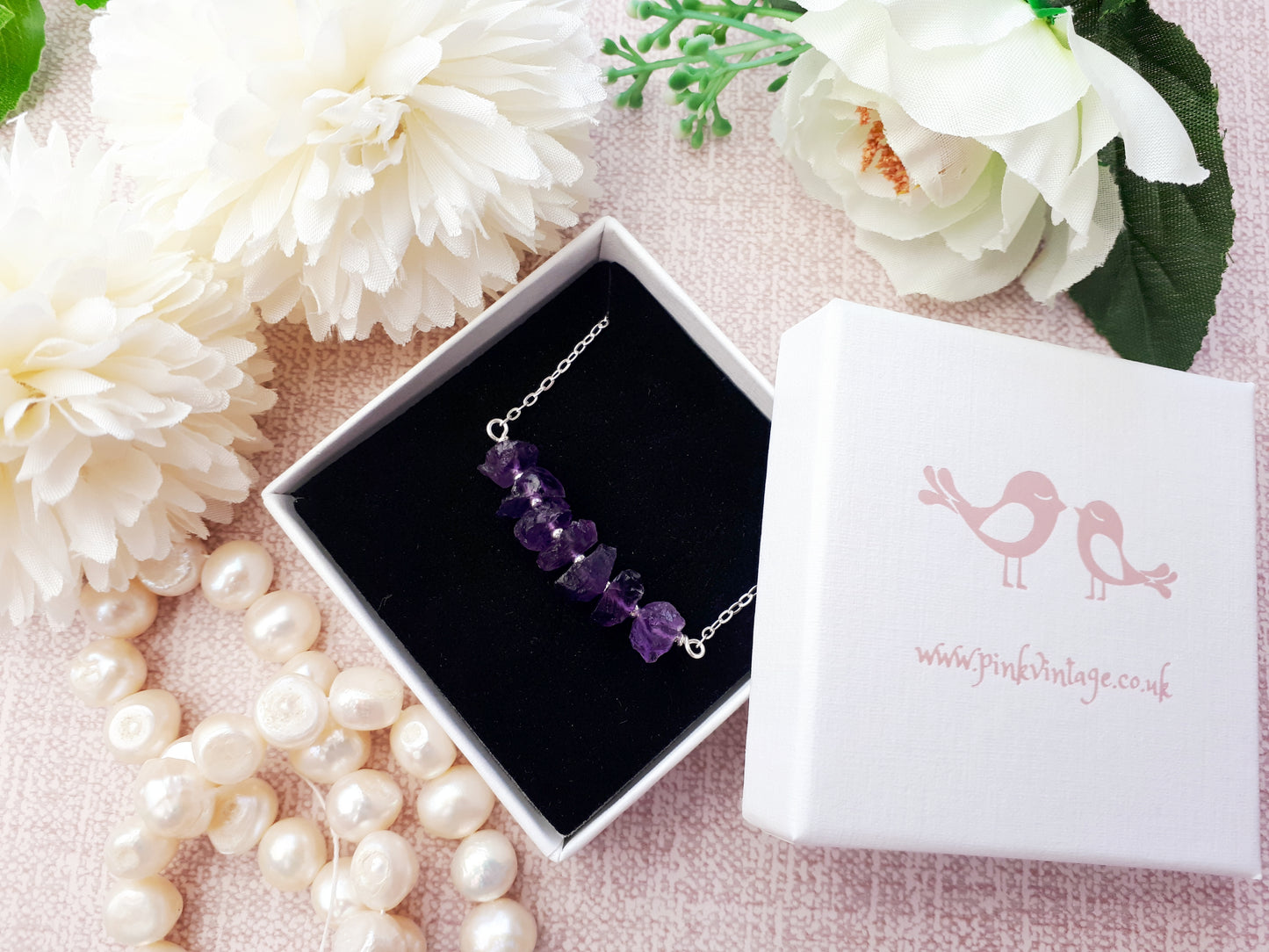 Raw amethyst necklace in sterling silver.