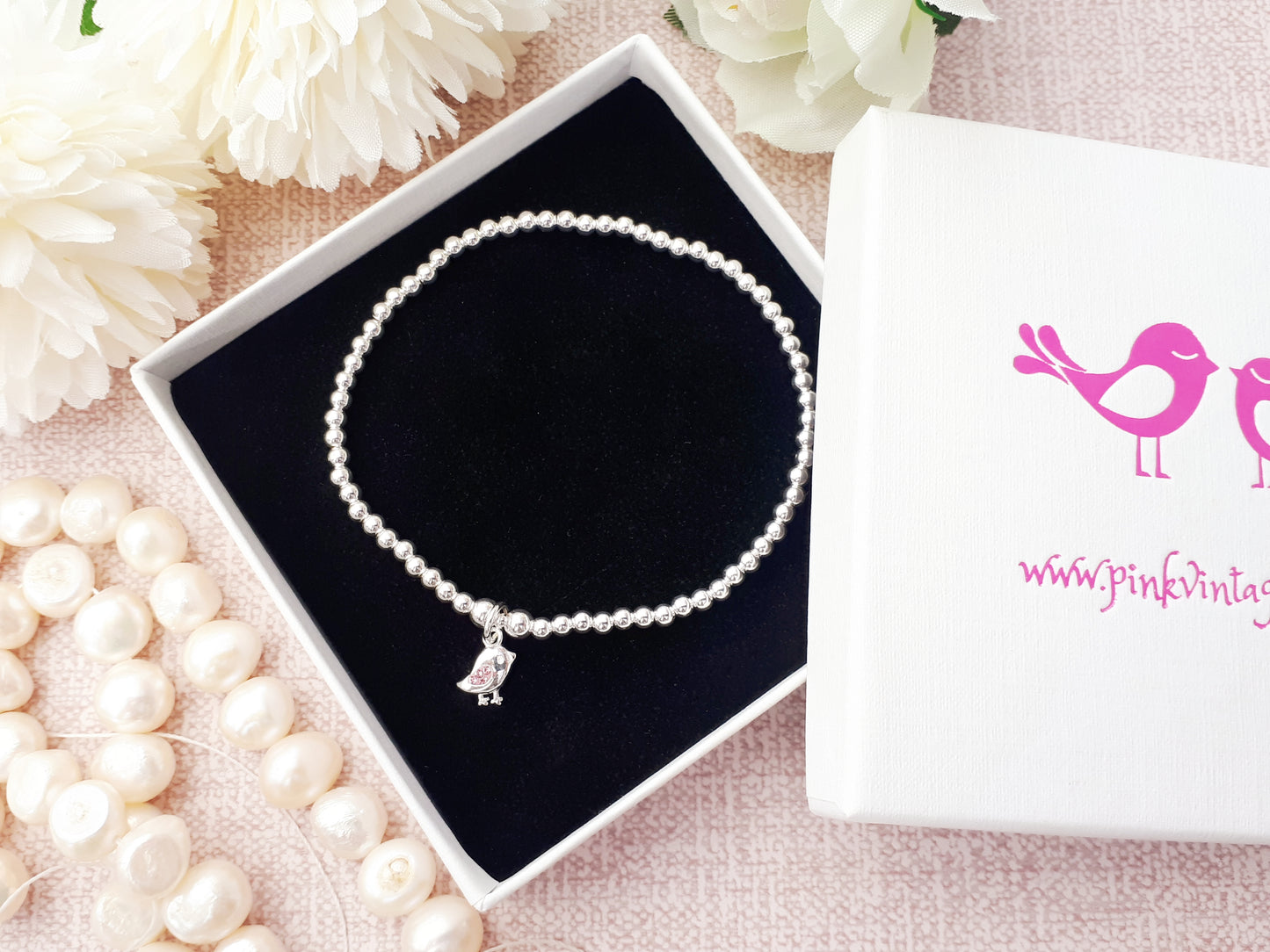 Bird charm bracelet.