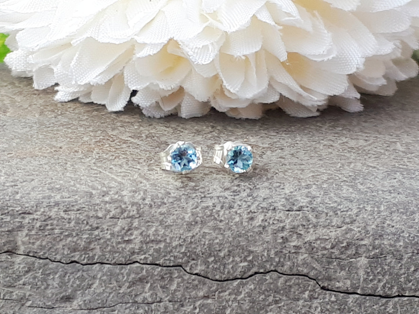 Aquamarine stud earrings in silver or gold.