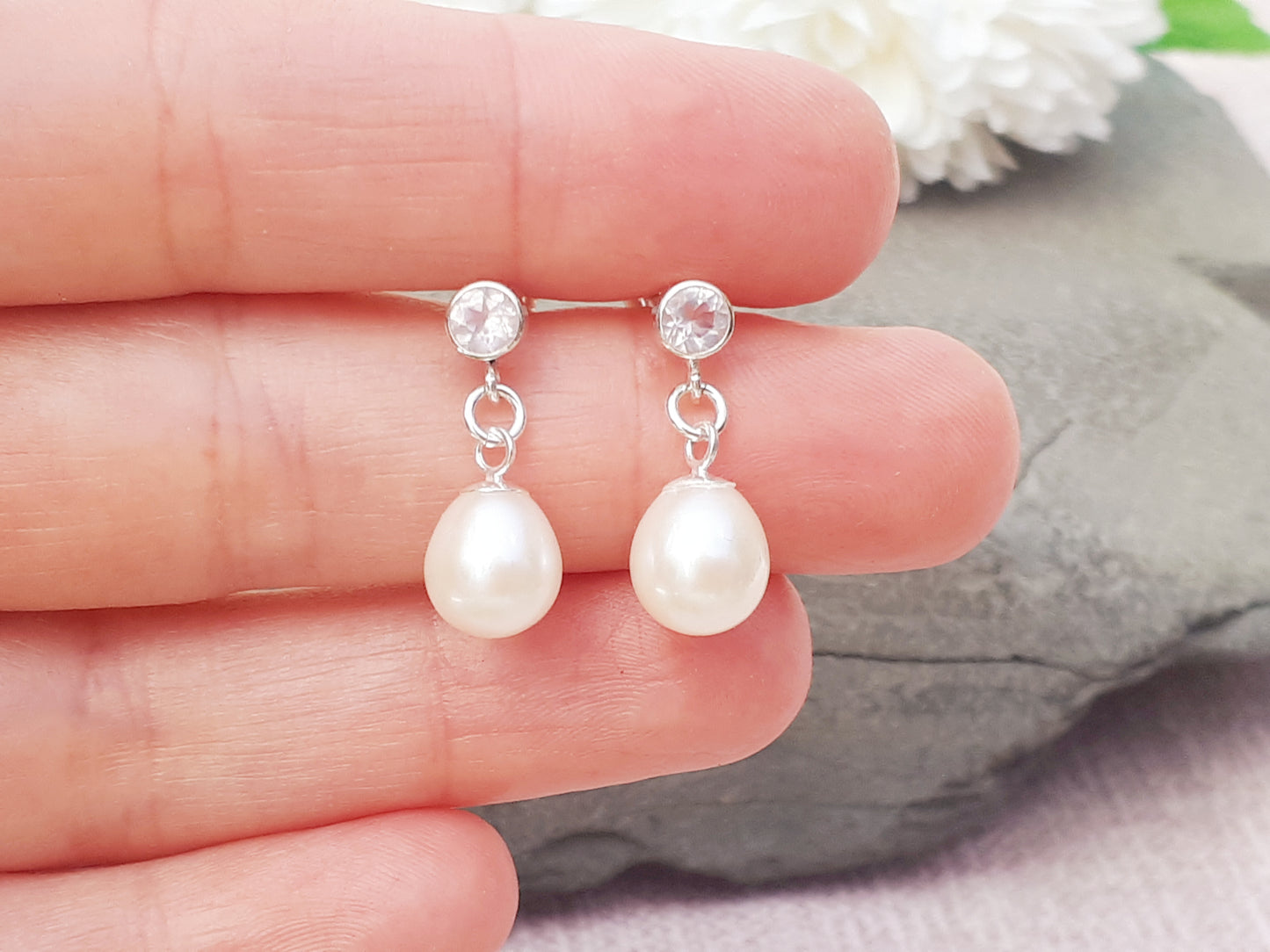 Rose quartz and pearl earrings.