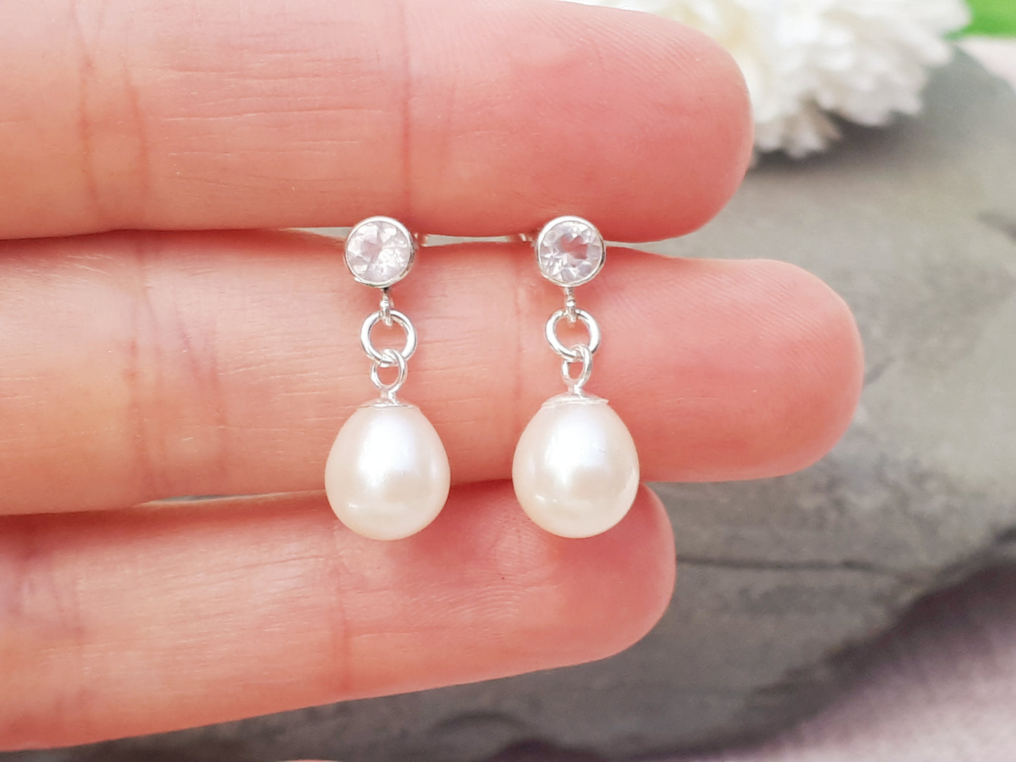 Rose quartz and pearl earrings.